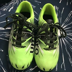 Kids neon green umbro cleats, size 11